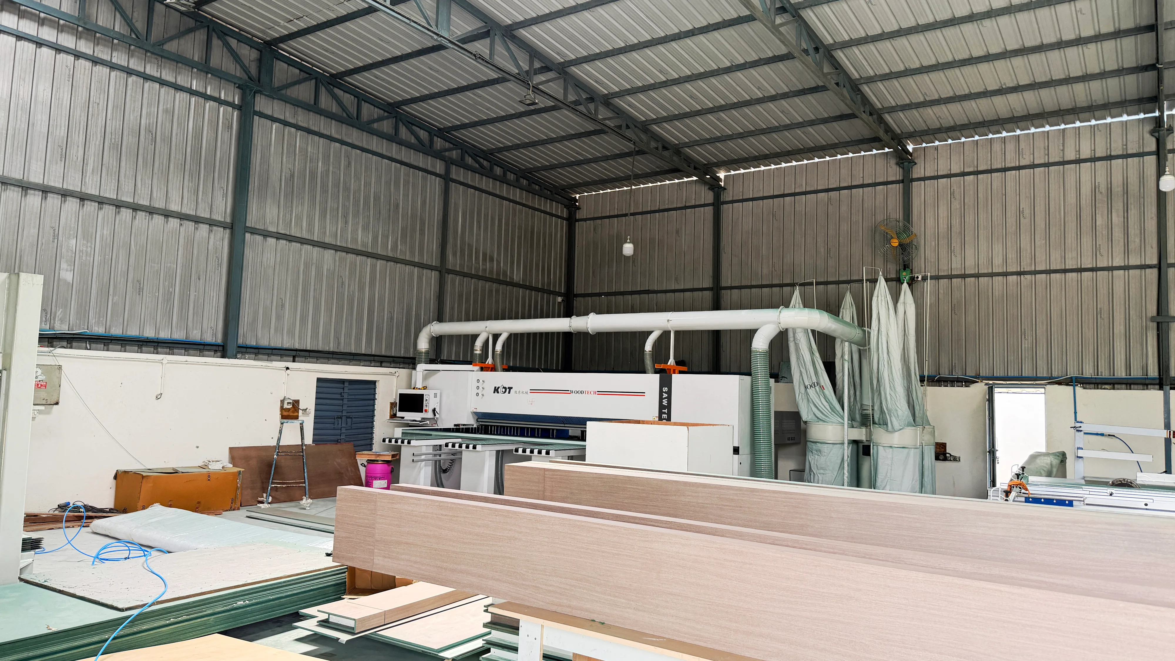 Velmont manufacturing facility — computerised panel saw with dust extraction